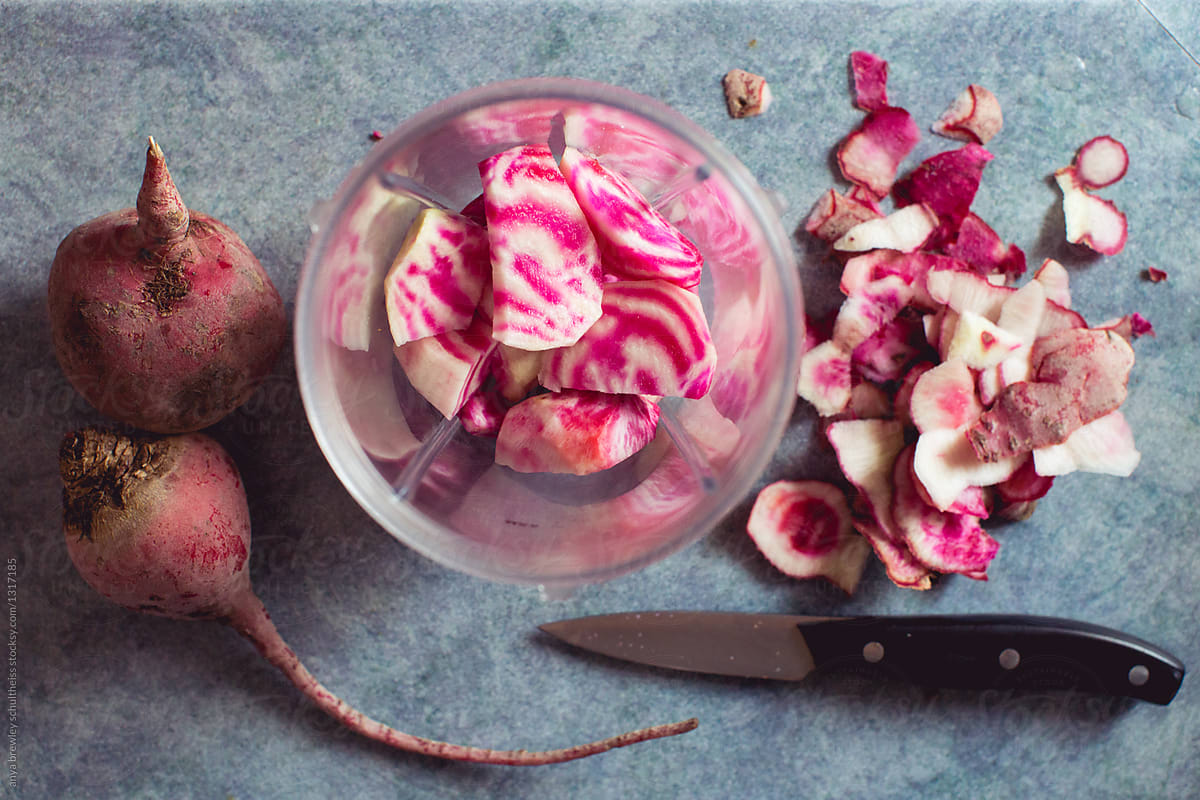 Blender cup full of chopped striped chioggia beets