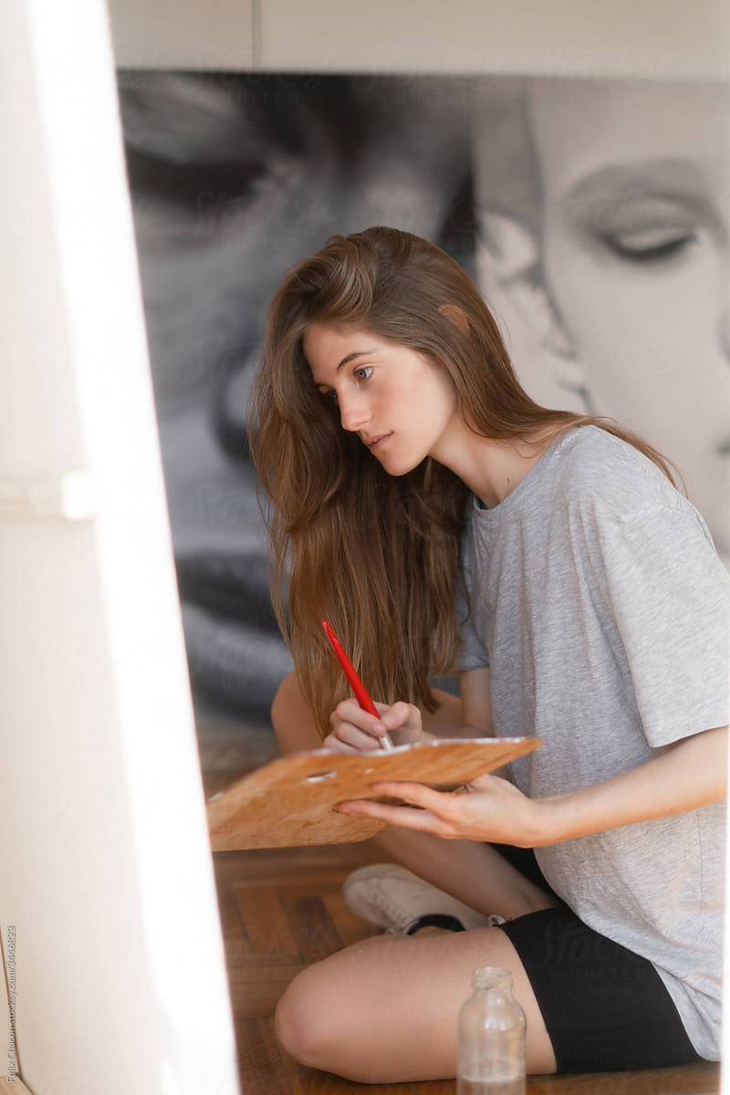 Artist Painting At Home Studio Blending Watercolor