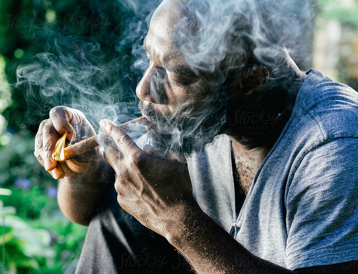 Man Lighting Cigar
