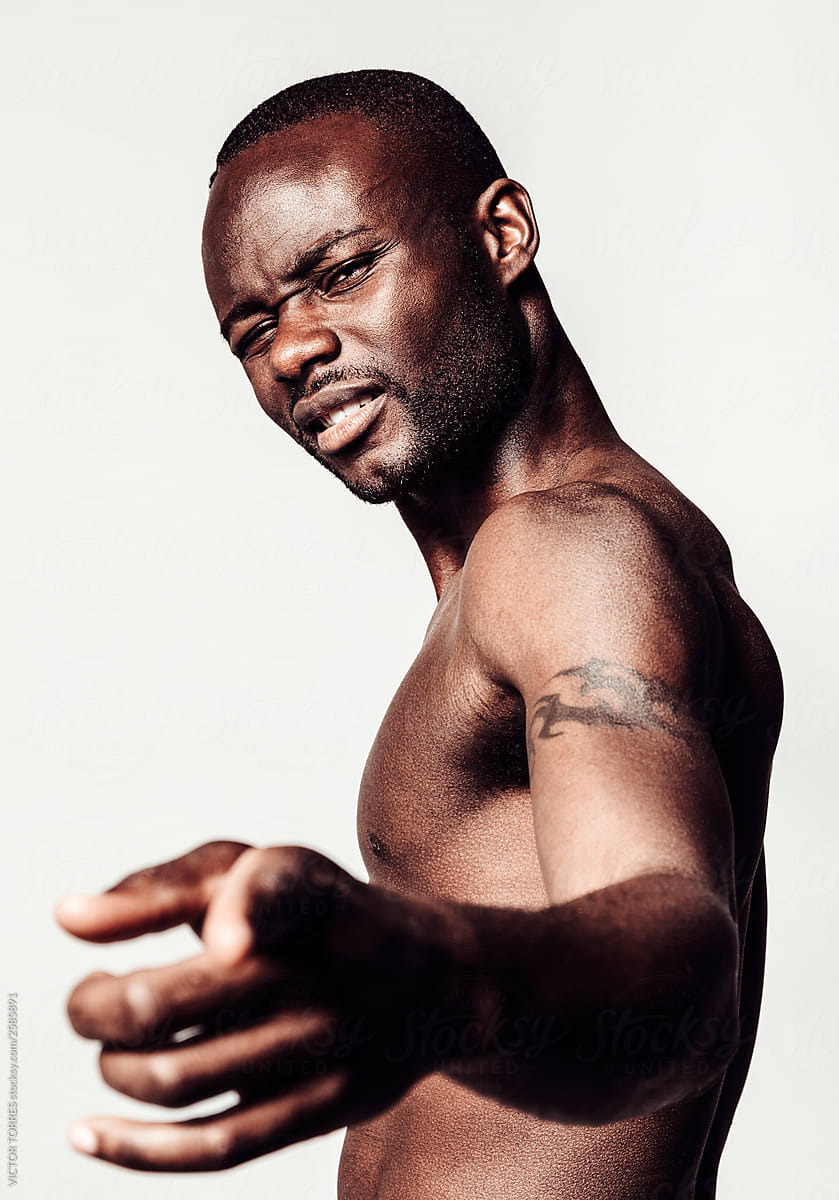 Shirtless muscle black man over white background