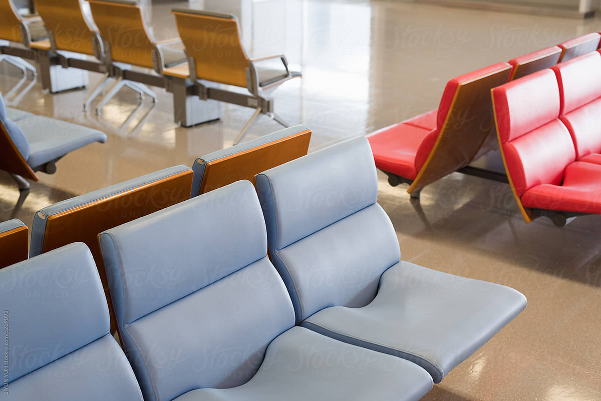 Red and blue seats in airport