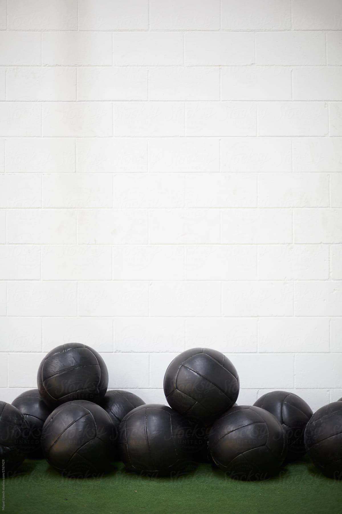Group of weight balls for exercises in a fitness club or gym