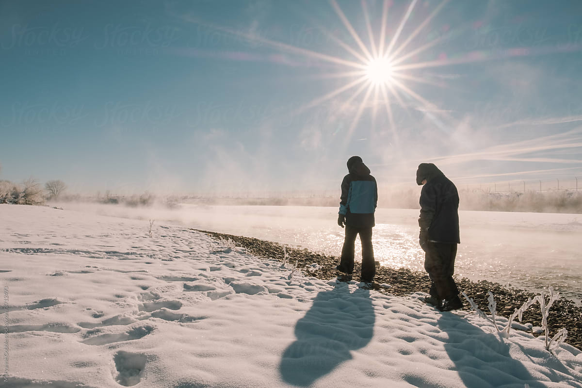 Bundled Kids in Cold Winter Landscape