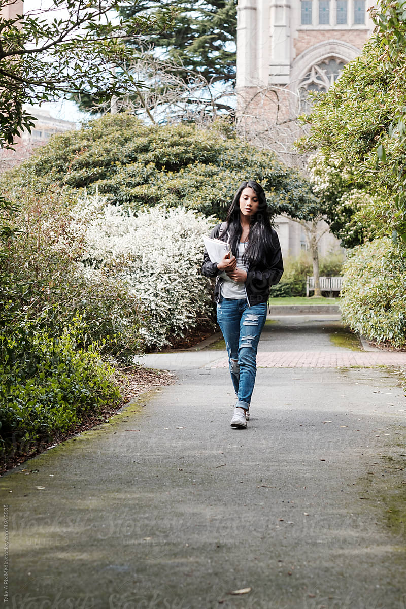 Asian College Student Walking in School