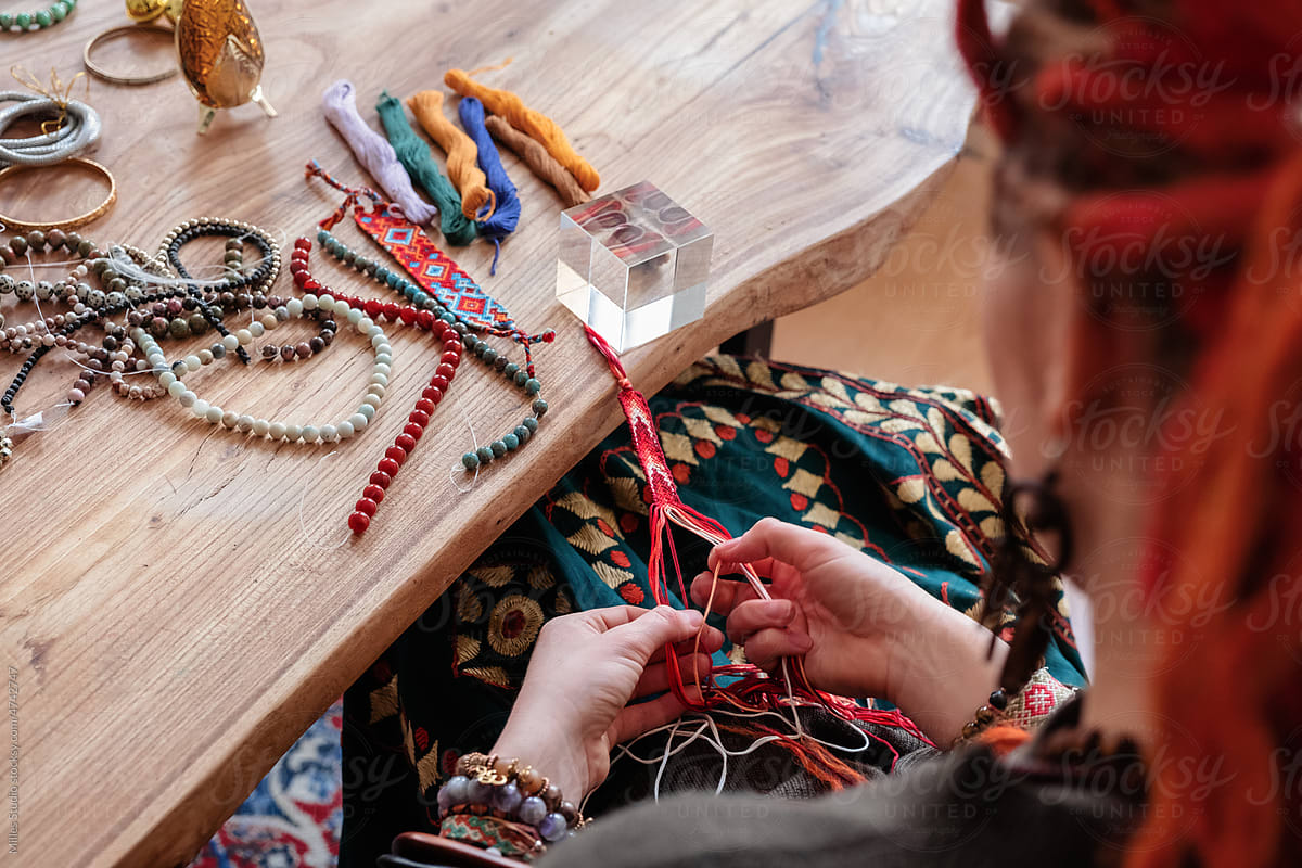 Female hippie crafting thread bracelet