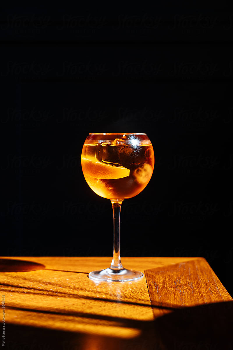 Delicious cocktail Spritz in sunlight on table
