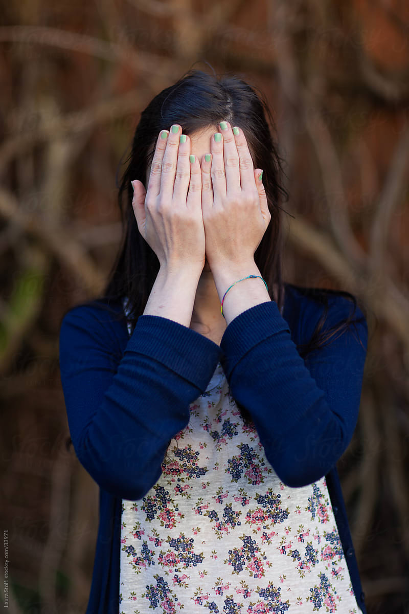 Young Woman Covering Her Face With Her Hands By Laura Stolfi Hide Face