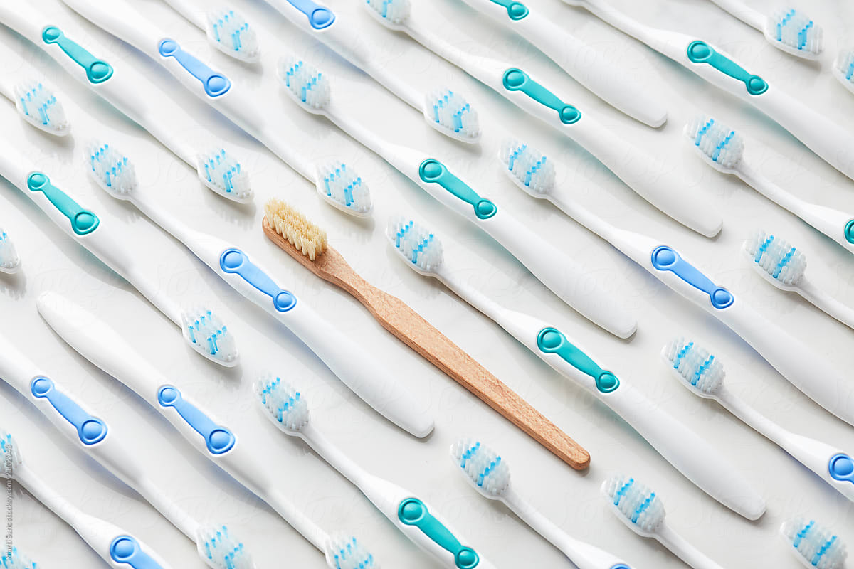 Bamboo toothbrush versus plastic toothbrush.