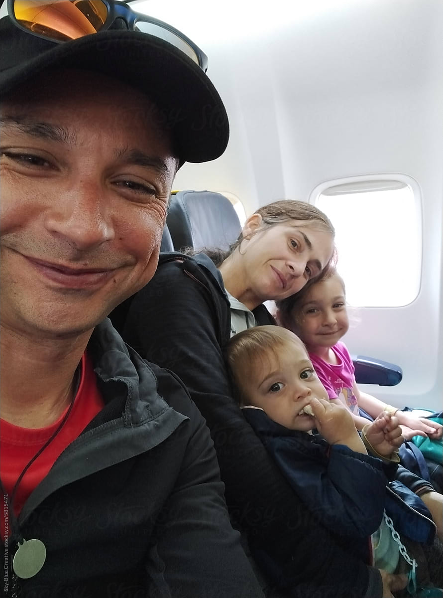 UGC Selfie of a family of four on a plane