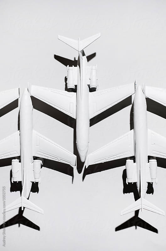 White airplane/jet formation on white background/miniature