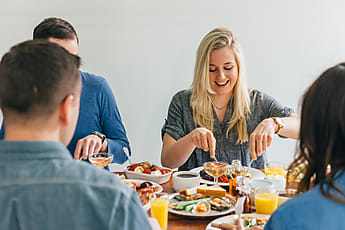 People Eating Breakfast At Home | Stocksy United