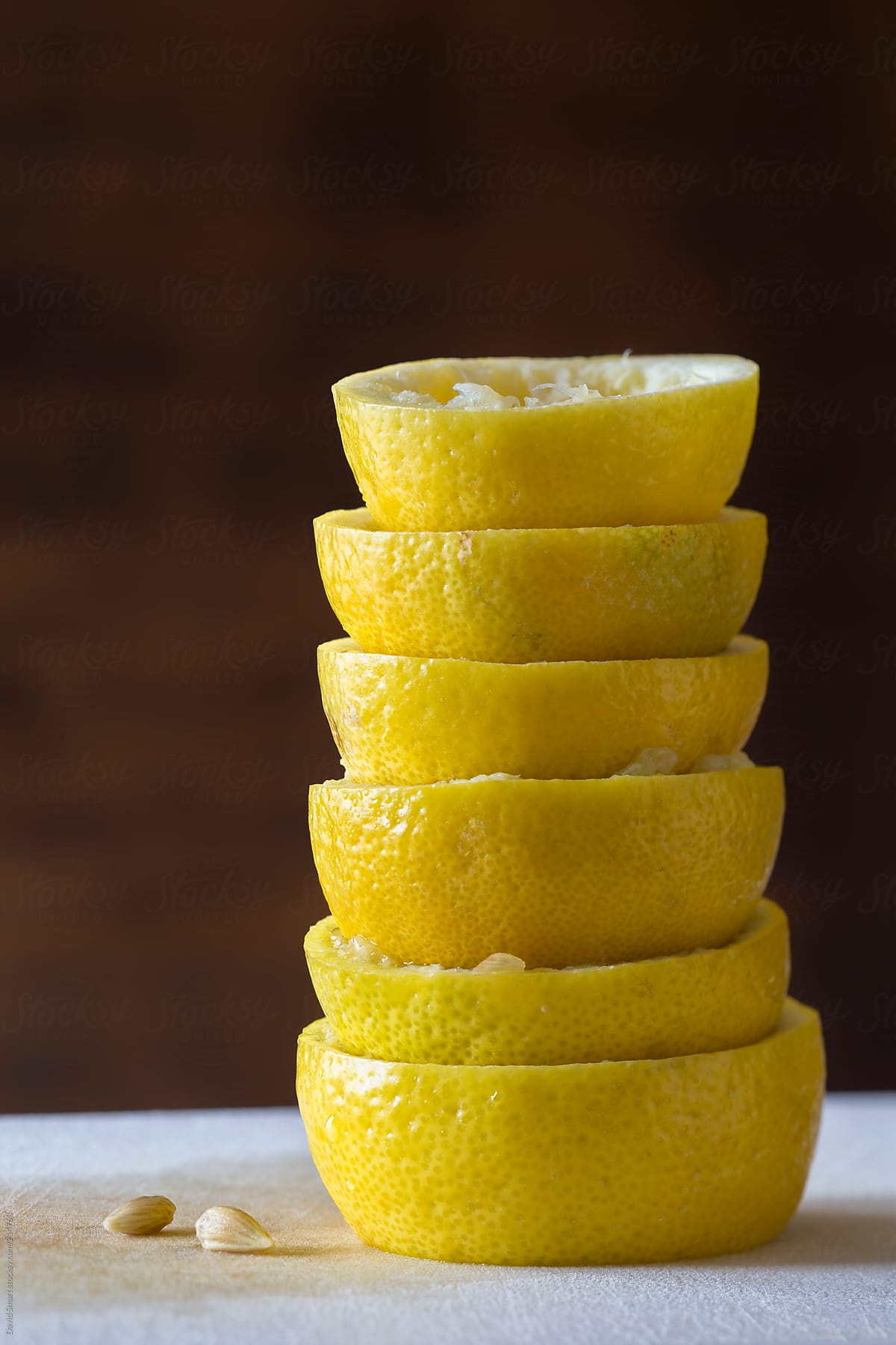 Stack of lemons that have been squeezed for lemonade