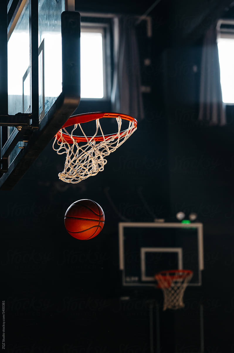 Basketball bring thrown into a hoop