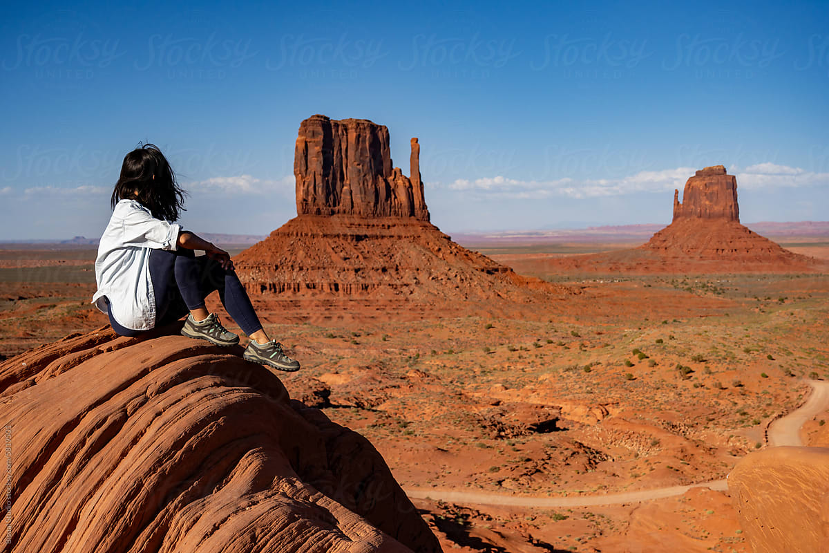 Woman admiring Monument Valley landscape
