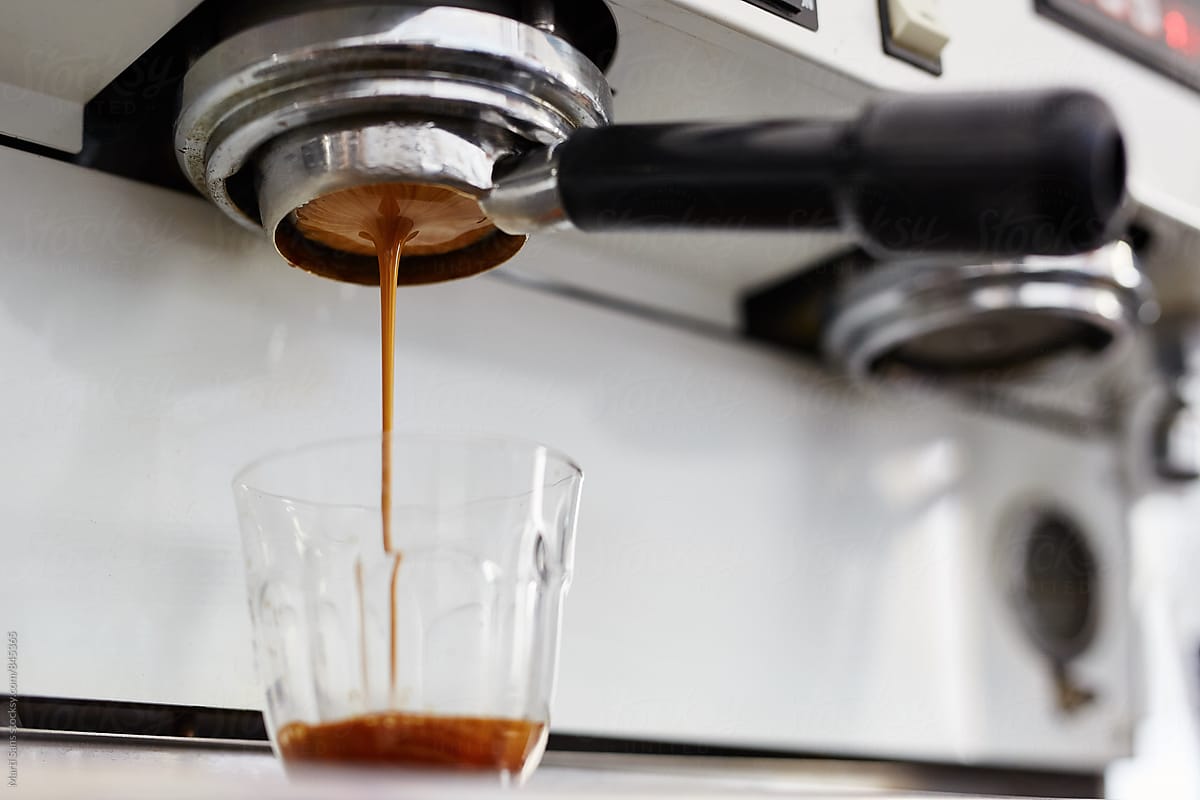 Close-up of espresso pouring in glass
