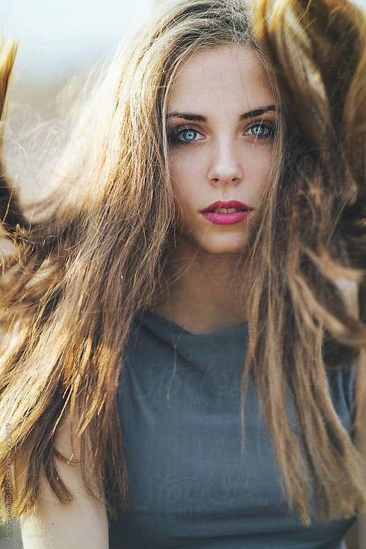 Beautiful Young Woman With Blue Eyes With Wind In Hair By Jovana Rikalo Stocksy United