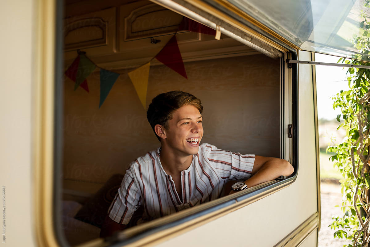young teenager in caravan
