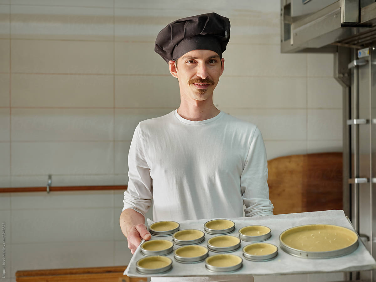 Portrait of a baker with baking pies