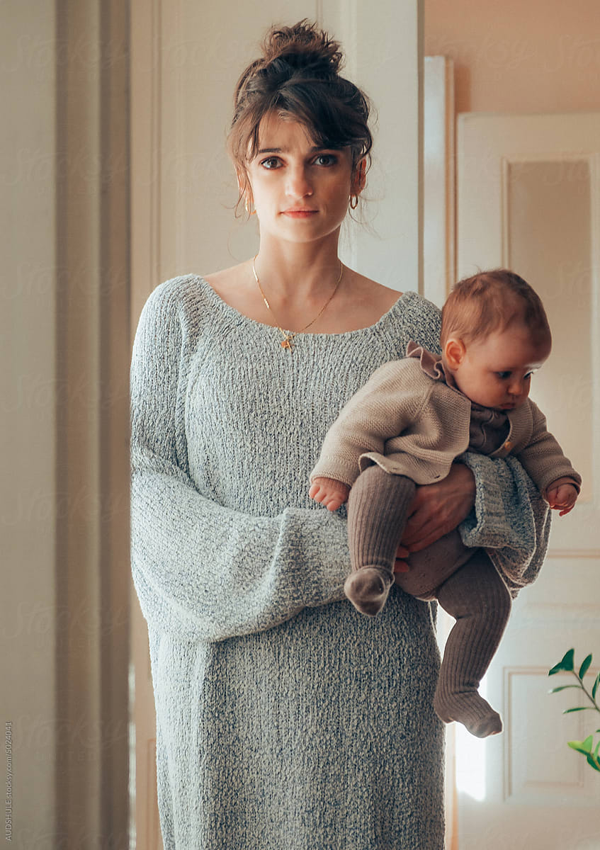 Beautiful woman and cute baby