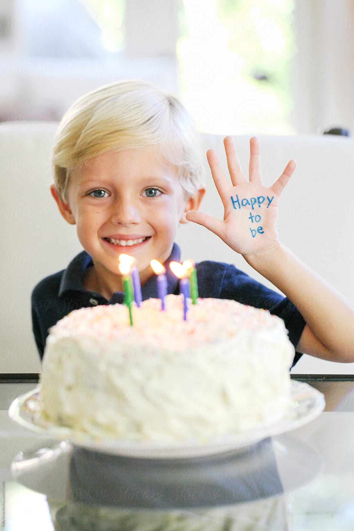 child with his birthday cake
