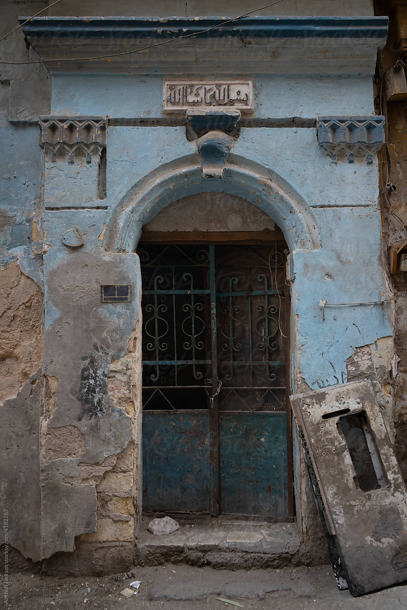 Weathered Doorway with Arabic