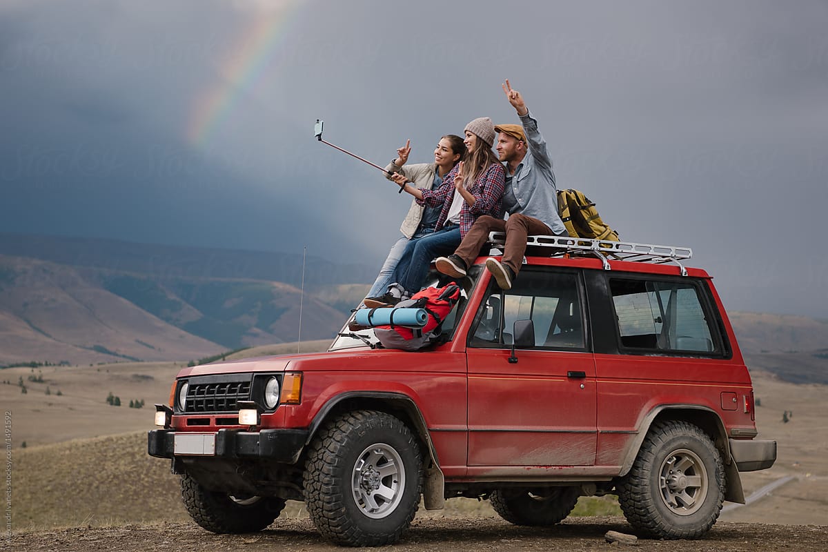 Travelers taking selfie on nature