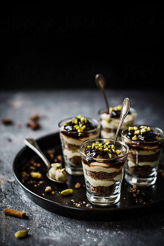 Layered dessert with ricotta cream, pistachios and caramelized figs