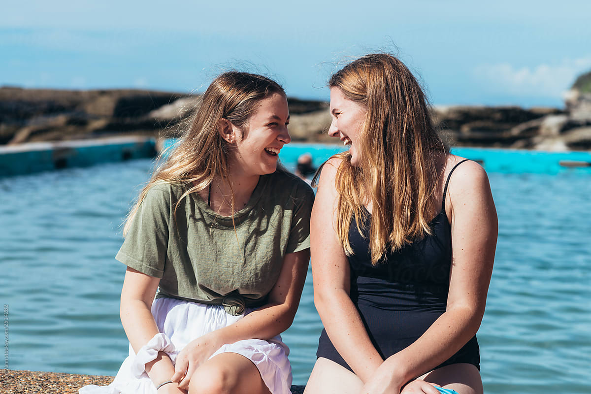 Sisters Laughing At The Beach By Stocksy Contributor Gillian Vann