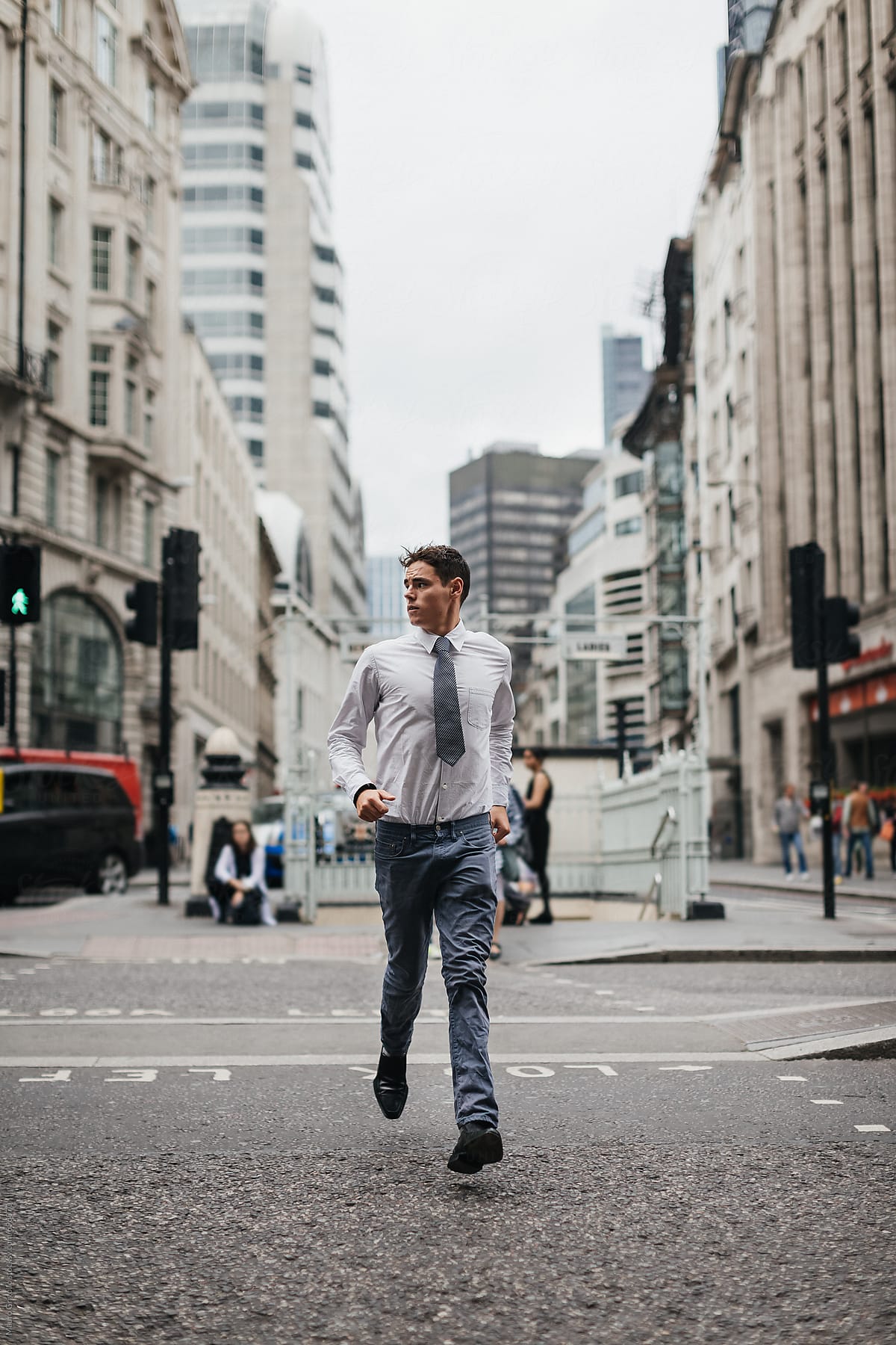 Businessman cross the street in a financial district