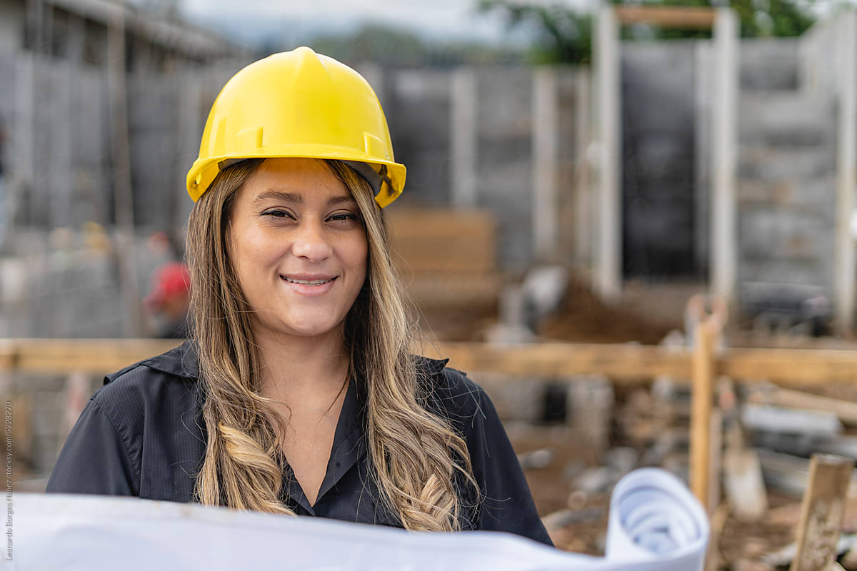 Portrait of a woman in a construction site
