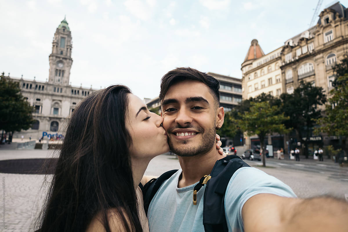 Selfie of a happy couple sightseeing in Porto