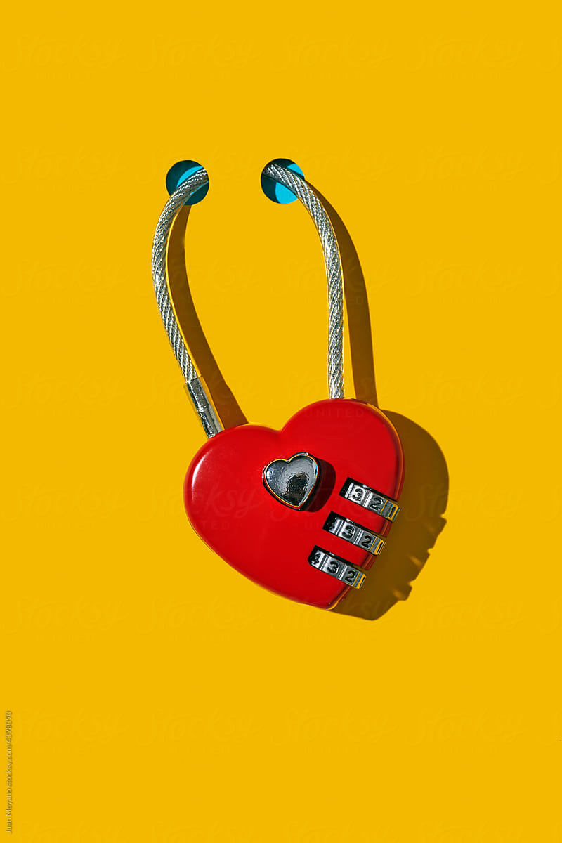 locked red heart-shaped padlock