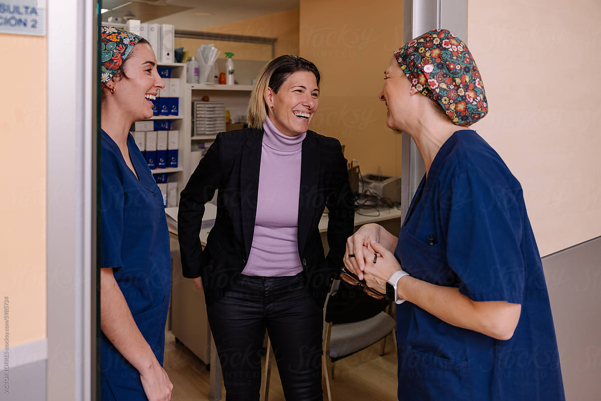 Healthcare professionals sharing a joyful moment