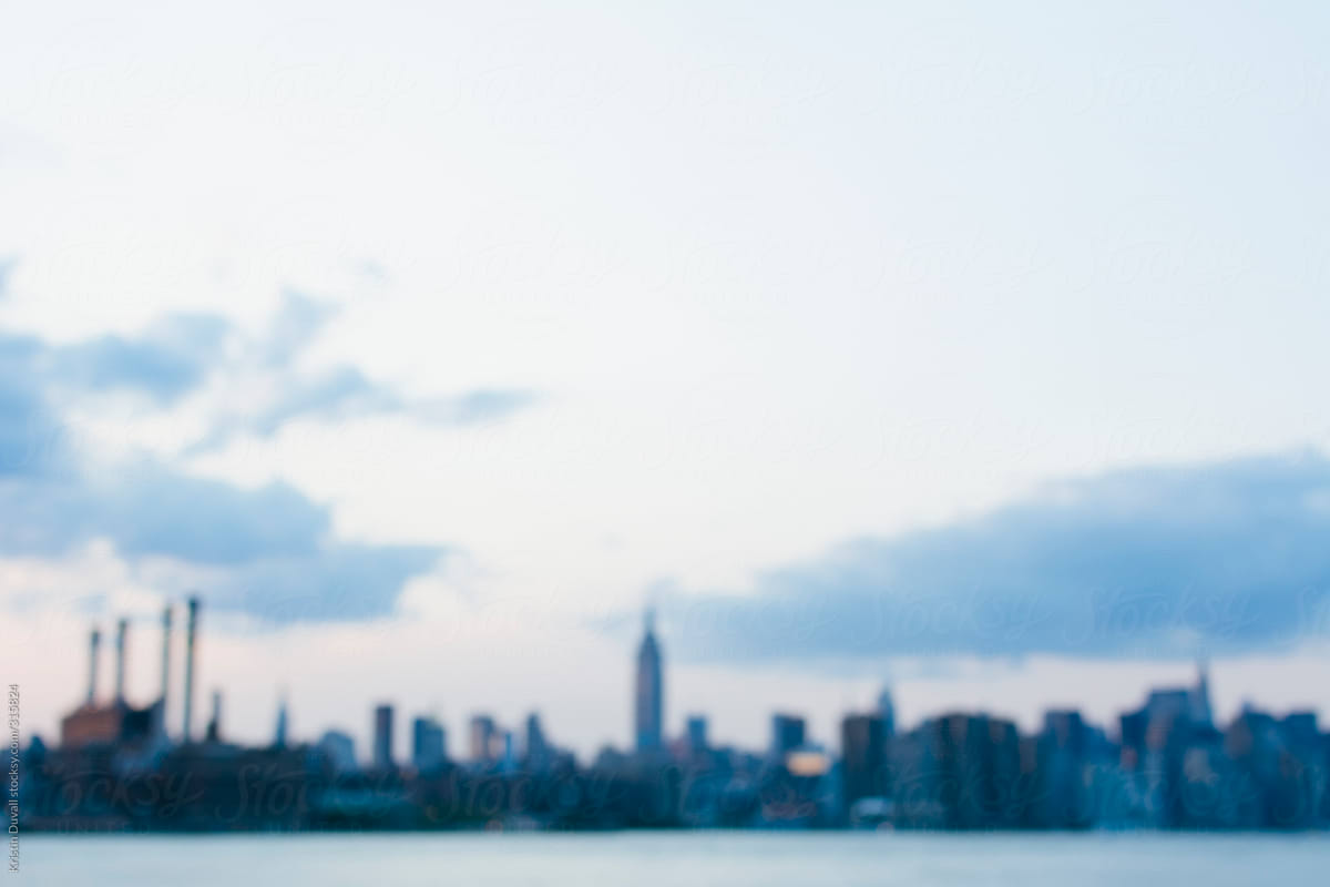 Blurred New York City skyline.