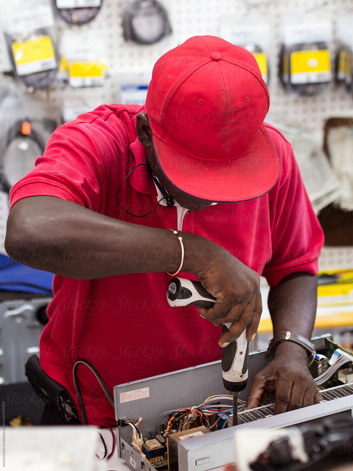 Male technician working on electrical equipment