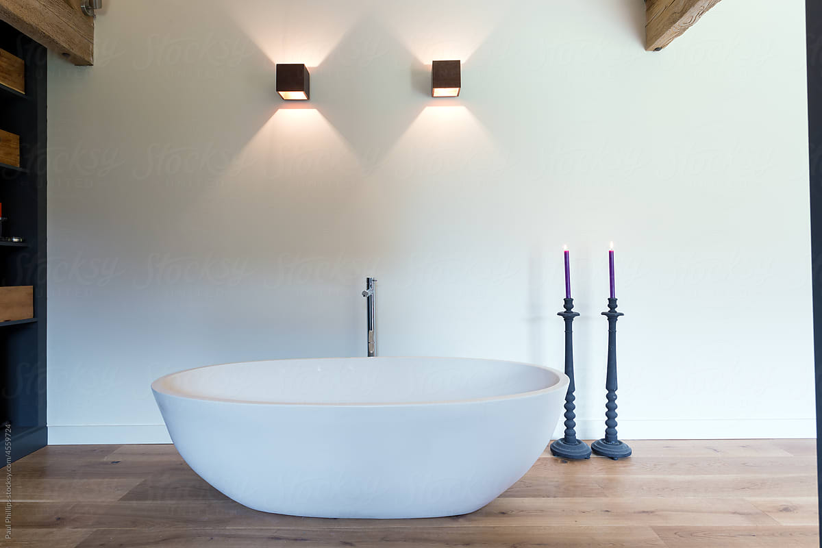Freestanding bath in the dressing area of a modern house.