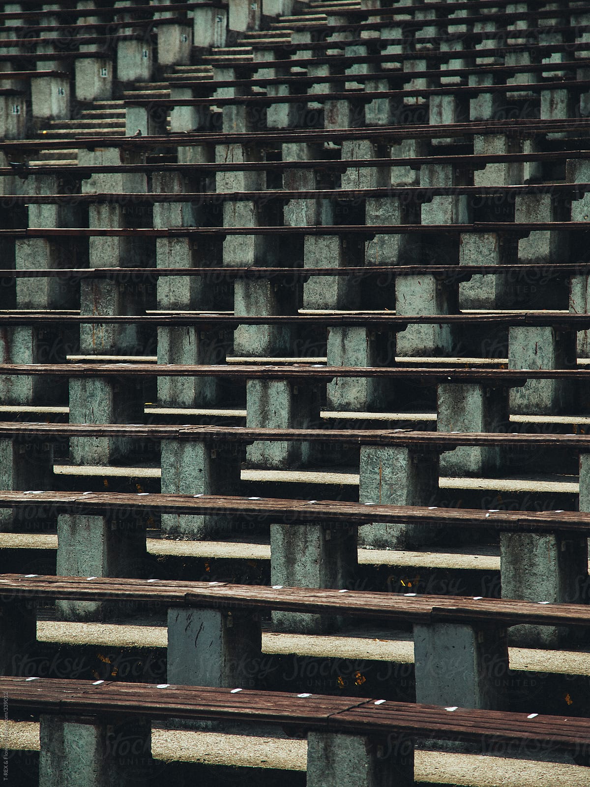 Old chairs at the tribune of football stadium