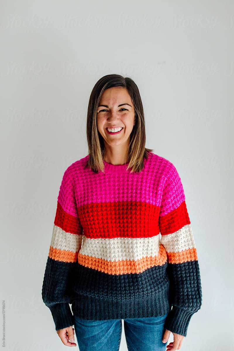 Smiling mid-30\'s woman wearing sweater