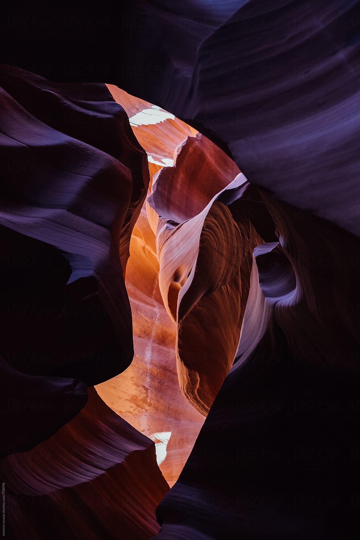 Hole between colorful sandstones in Antelope Canyon