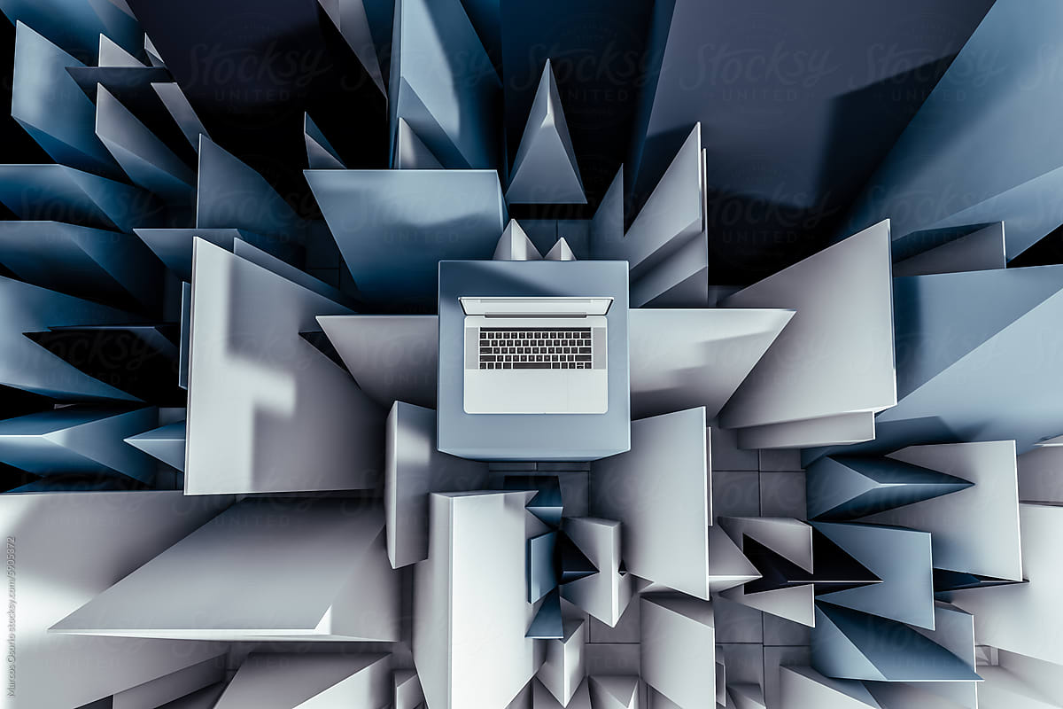 Laptop on Tower Surrounded by White and Blue Objects