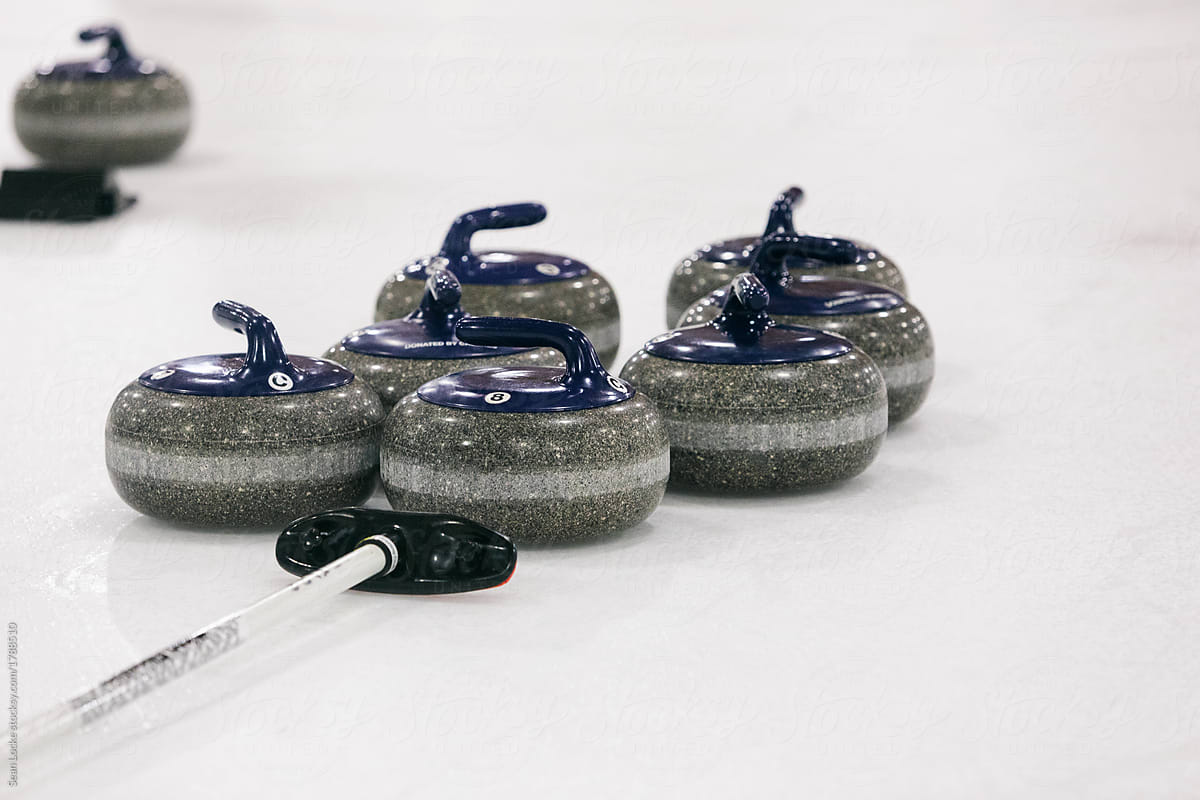 Curling: Team\'s Stones Sit On Ice With Broom