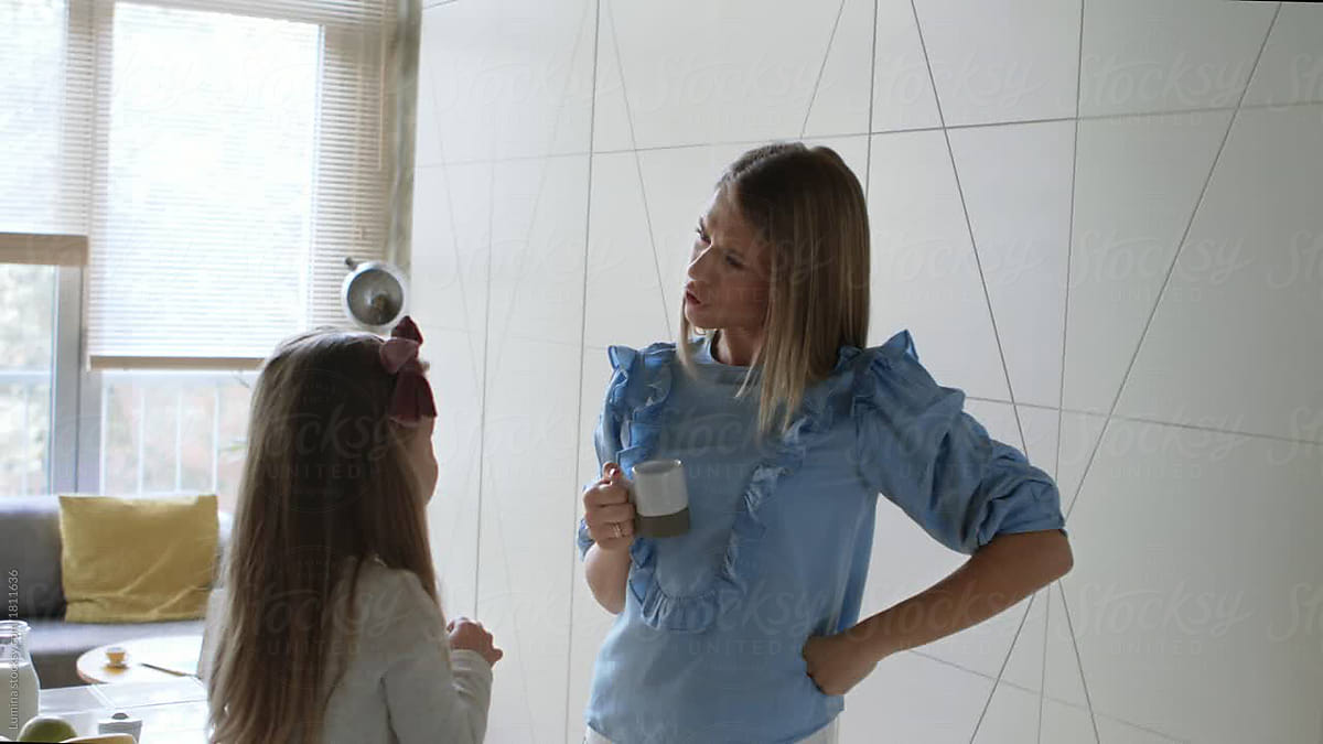 Mom Smiling And Playing With Her Daughter By Stocksy Contributor Lumina Stocksy 