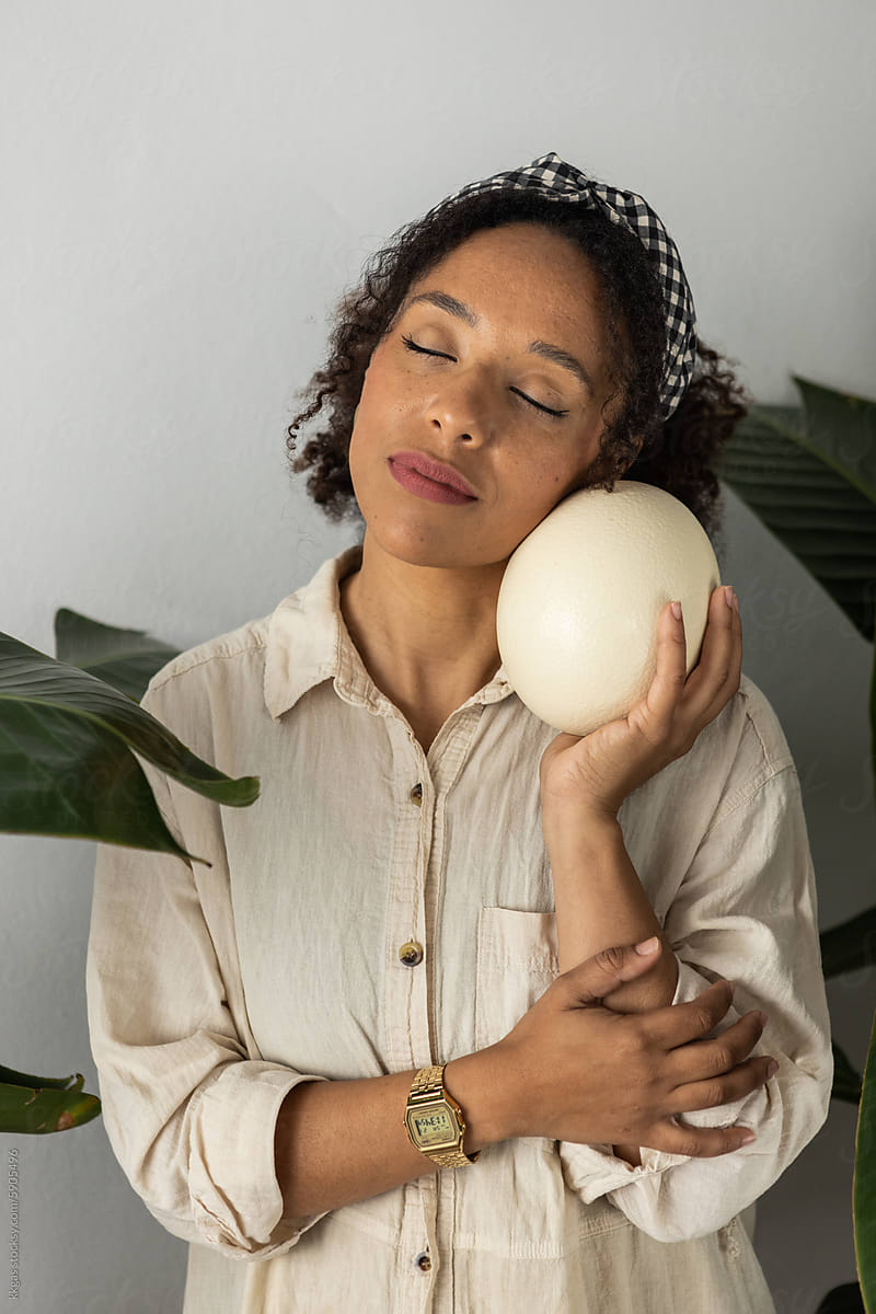 Woman with ostrich egg