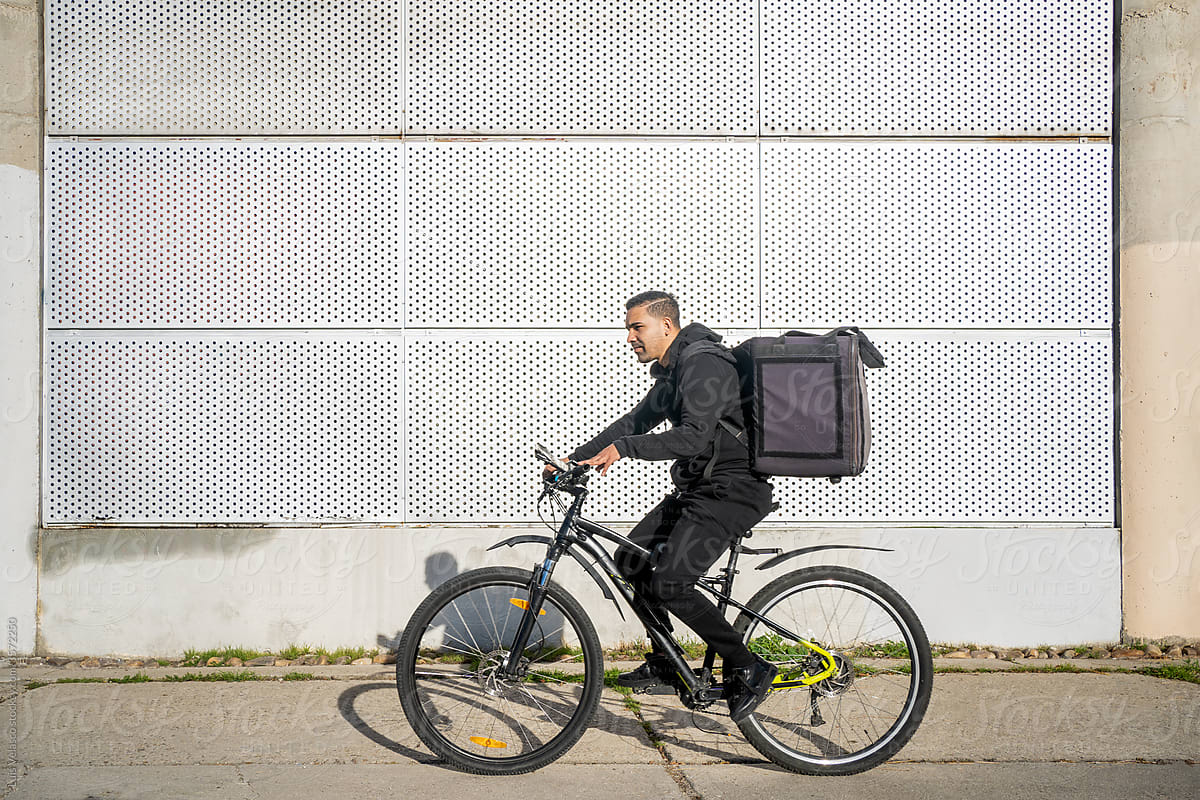 Courier With Bike Delivering Food.
