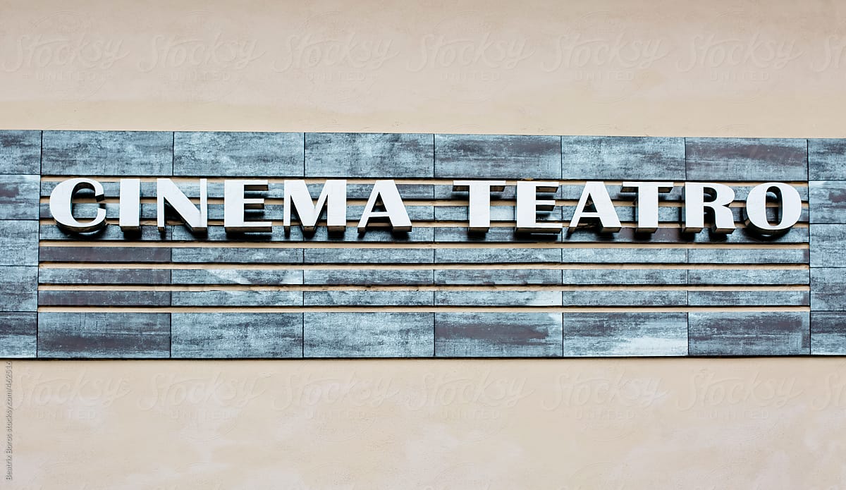 Cinema and theatre sign in Italian on a wall