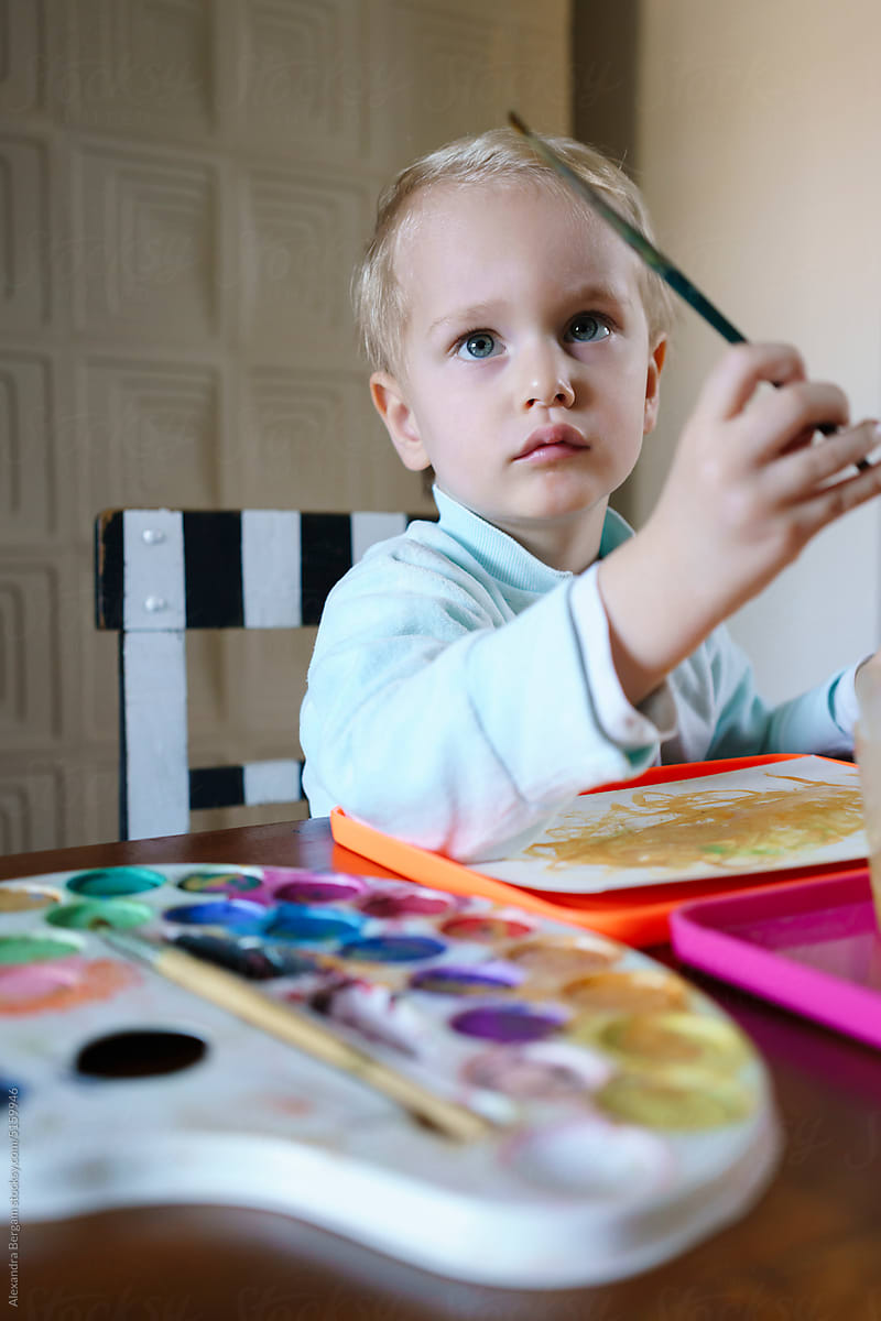 Artist child paint with watercolor