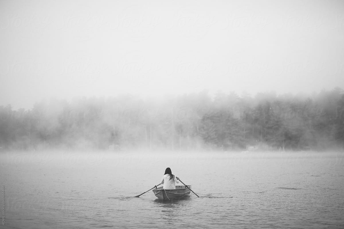 Mysterious Woman In Row Boat On A Foggy New England Morning Del Colaborador De Stocksy Howl