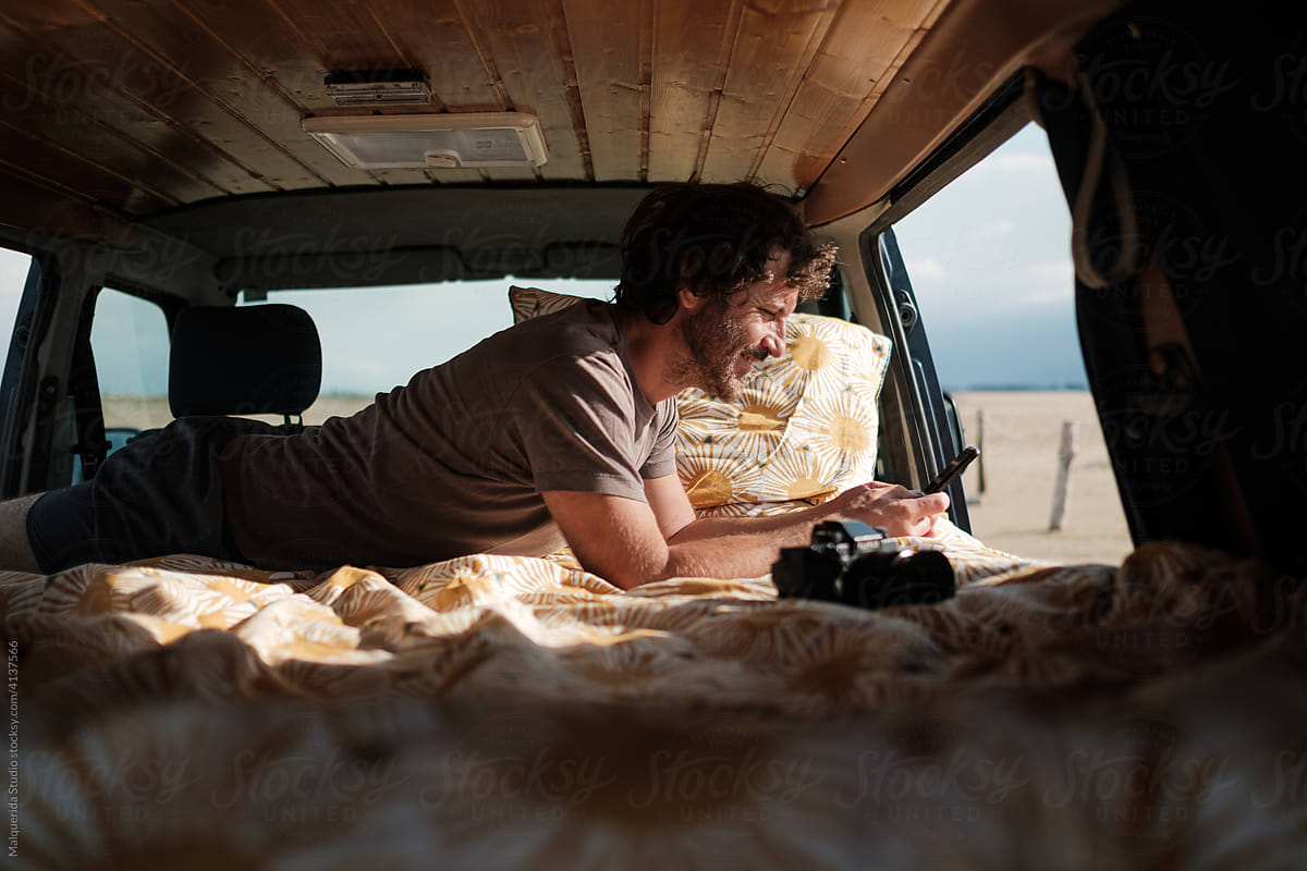 Man on the bed in a camper