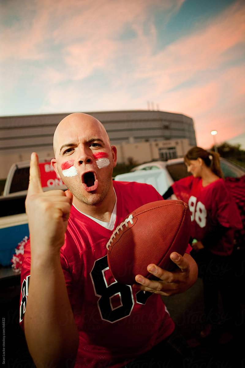 Tailgating: Excited Fan Cheers for Team