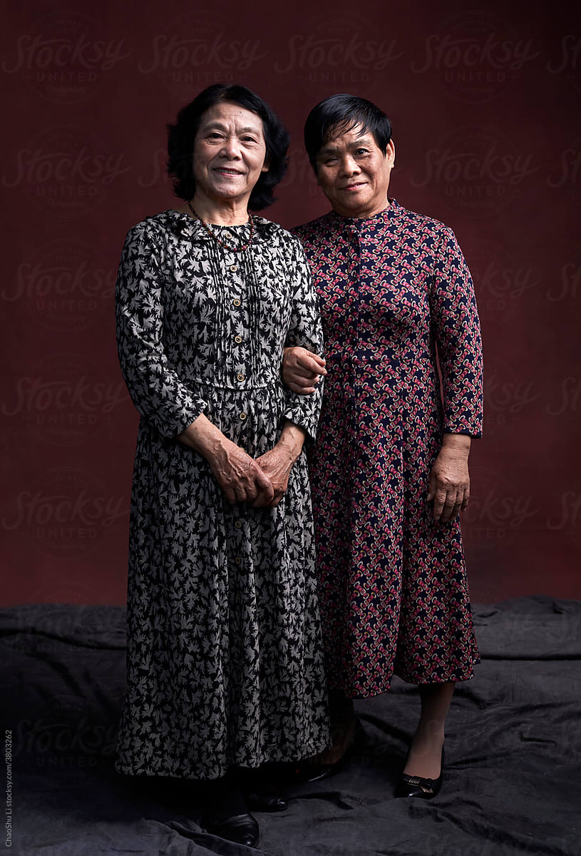 Portrait of older sisters in Asia, indoor